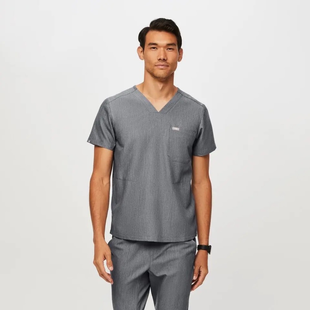 Men’s Chisec Three-Pocket Scrub Top in Graphite Gray.